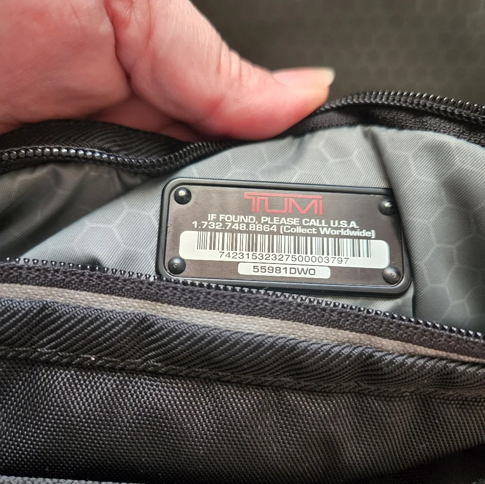 Tumi Black and Cream Backpack